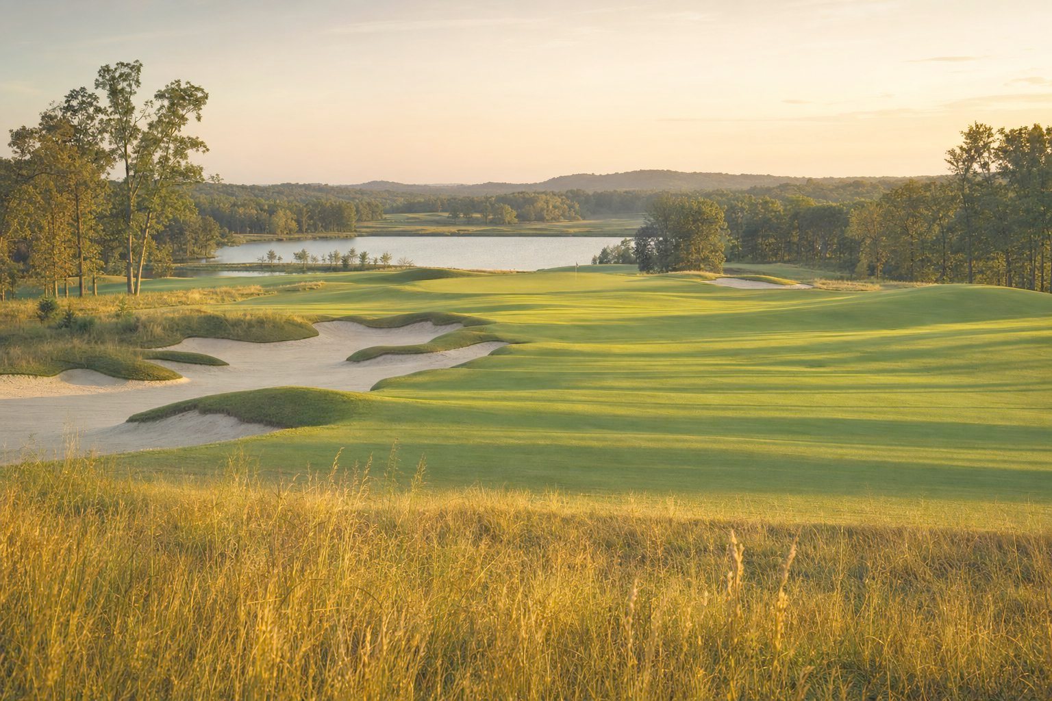 A links-style golf hole under a wide sky